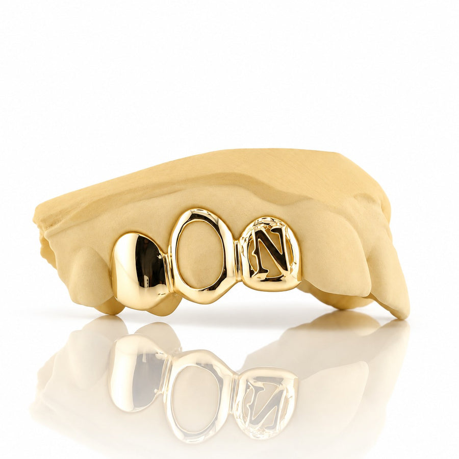 Custom 3pc grillz with solid cap, open face and initial letter, yellow gold plated 925 silver - angle 1