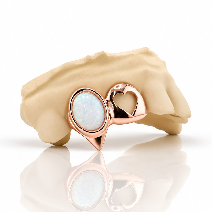Custom 2pc grillz with white opal and open heart fang, rose gold plated 925 silver - angle 1