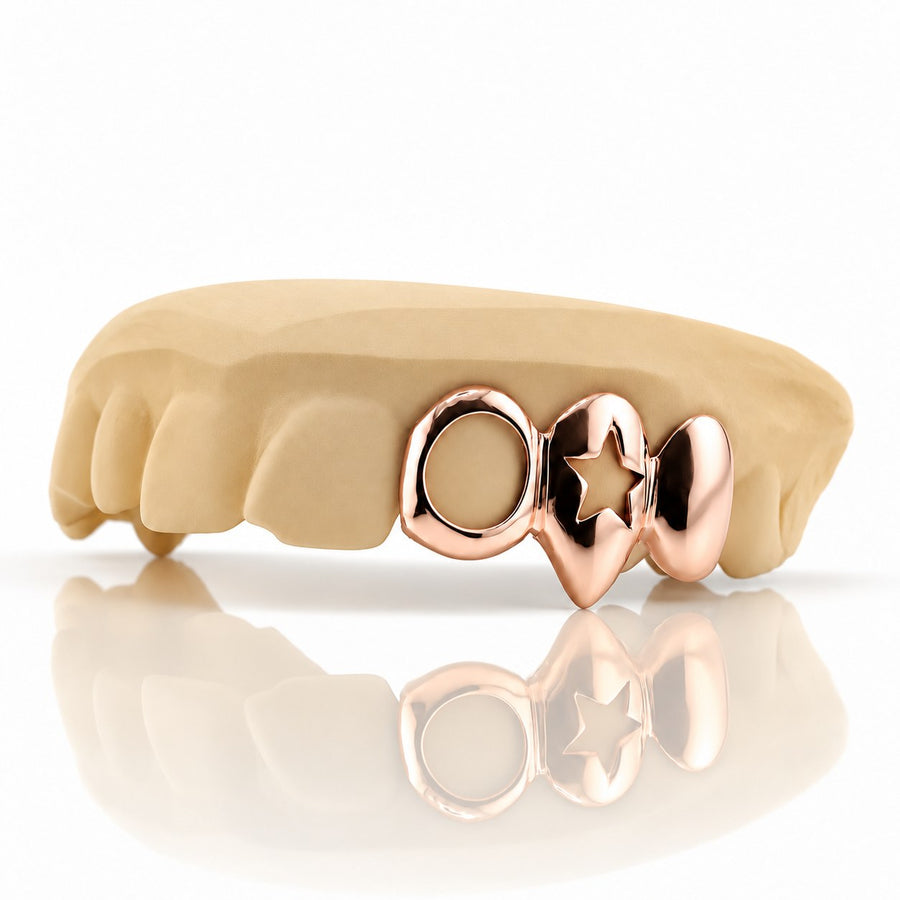 Custom top grillz with open face, star cutout fang and solid cap, rose gold plated 925 silver - angle 1