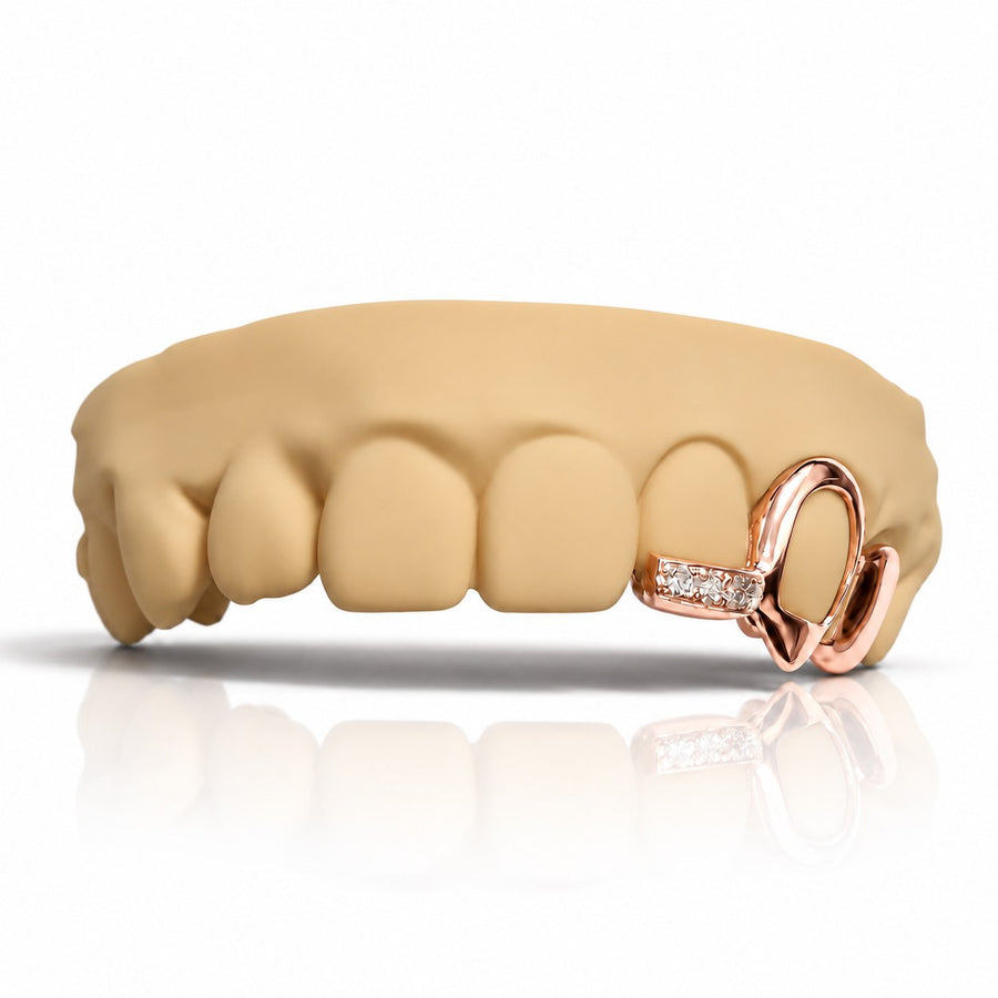 Custom grillz with open face fang and moissanite textured band, rose gold plated 925 silver - angle 1