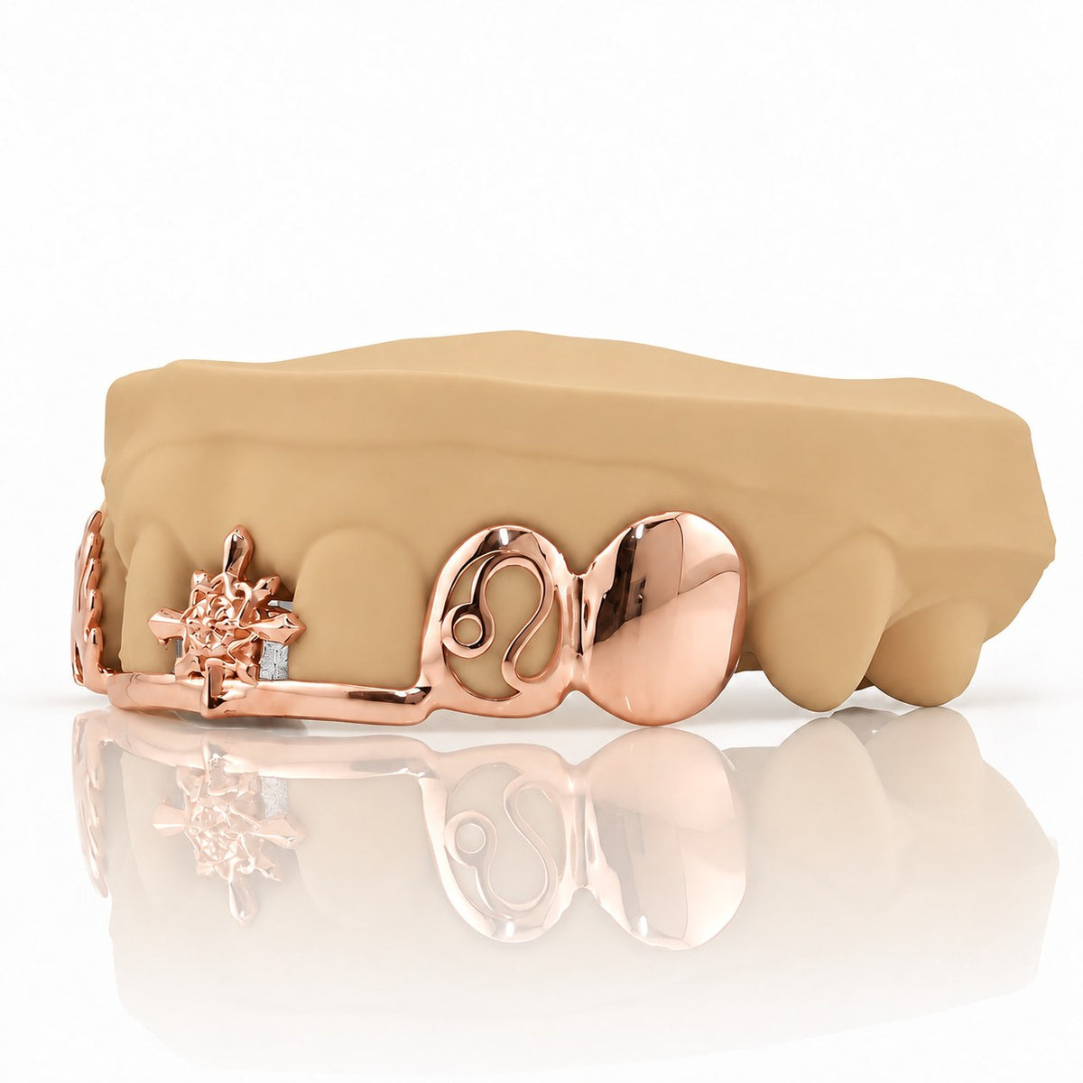 Custom top grillz with compass star, flame and Leo zodiac on a front bar, rose gold plated 925 silver - angle 1