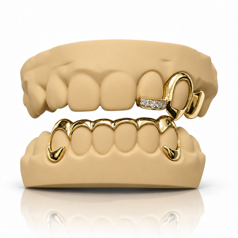 Custom top and bottom grillz with open face caps, fangs and a gemstone bar, yellow gold plated 925 silver - angle 1