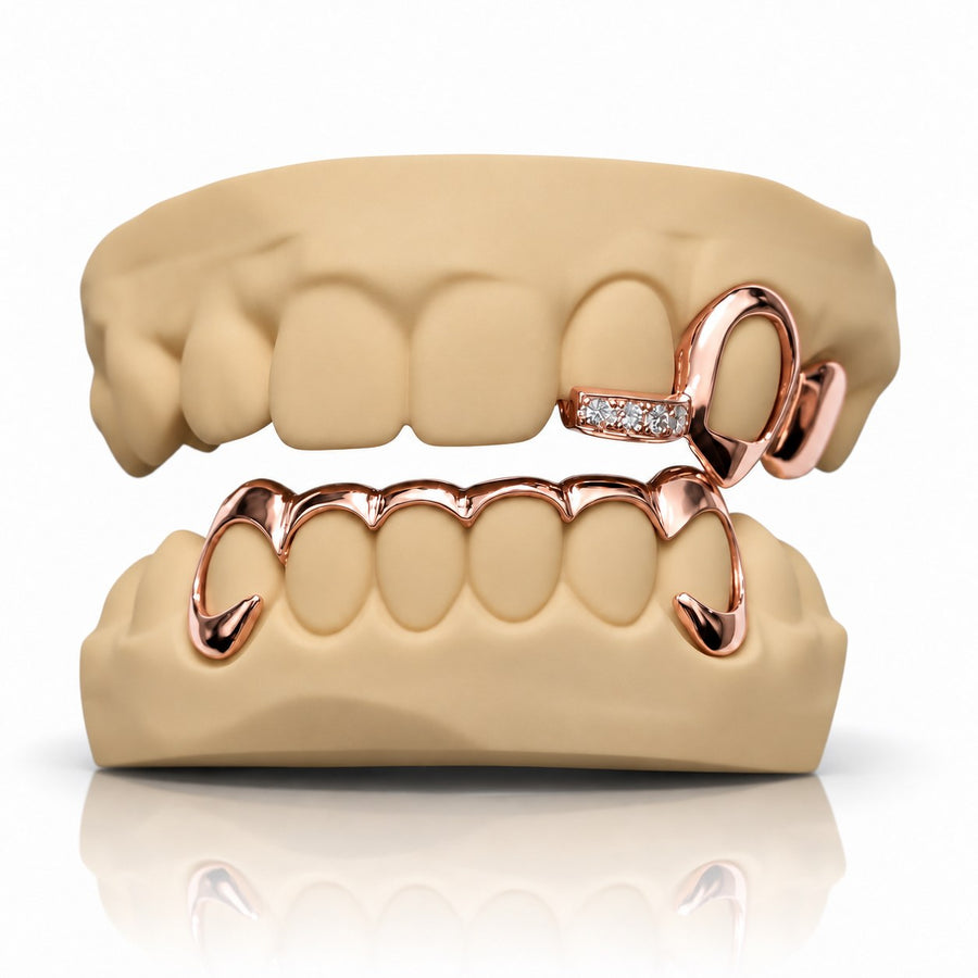 Custom top and bottom grillz with open face caps, fangs and a gemstone bar, rose gold plated 925 silver - angle 1