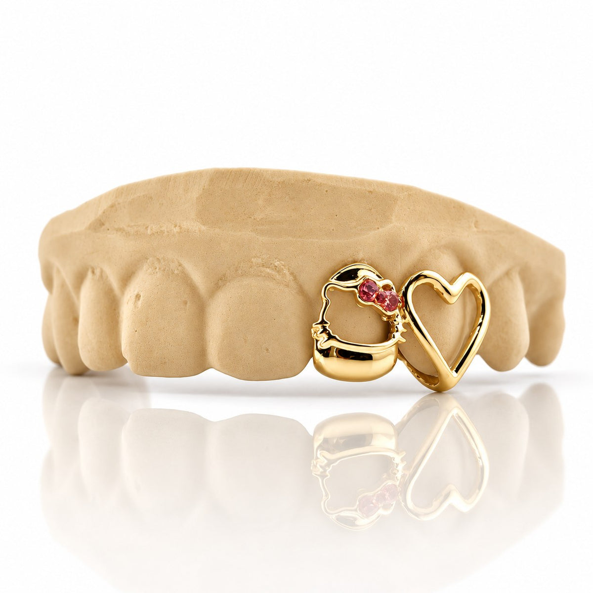 Custom 2pc top grillz with kitty face, pink stone bow and open heart, yellow gold plated 925 silver - angle 1