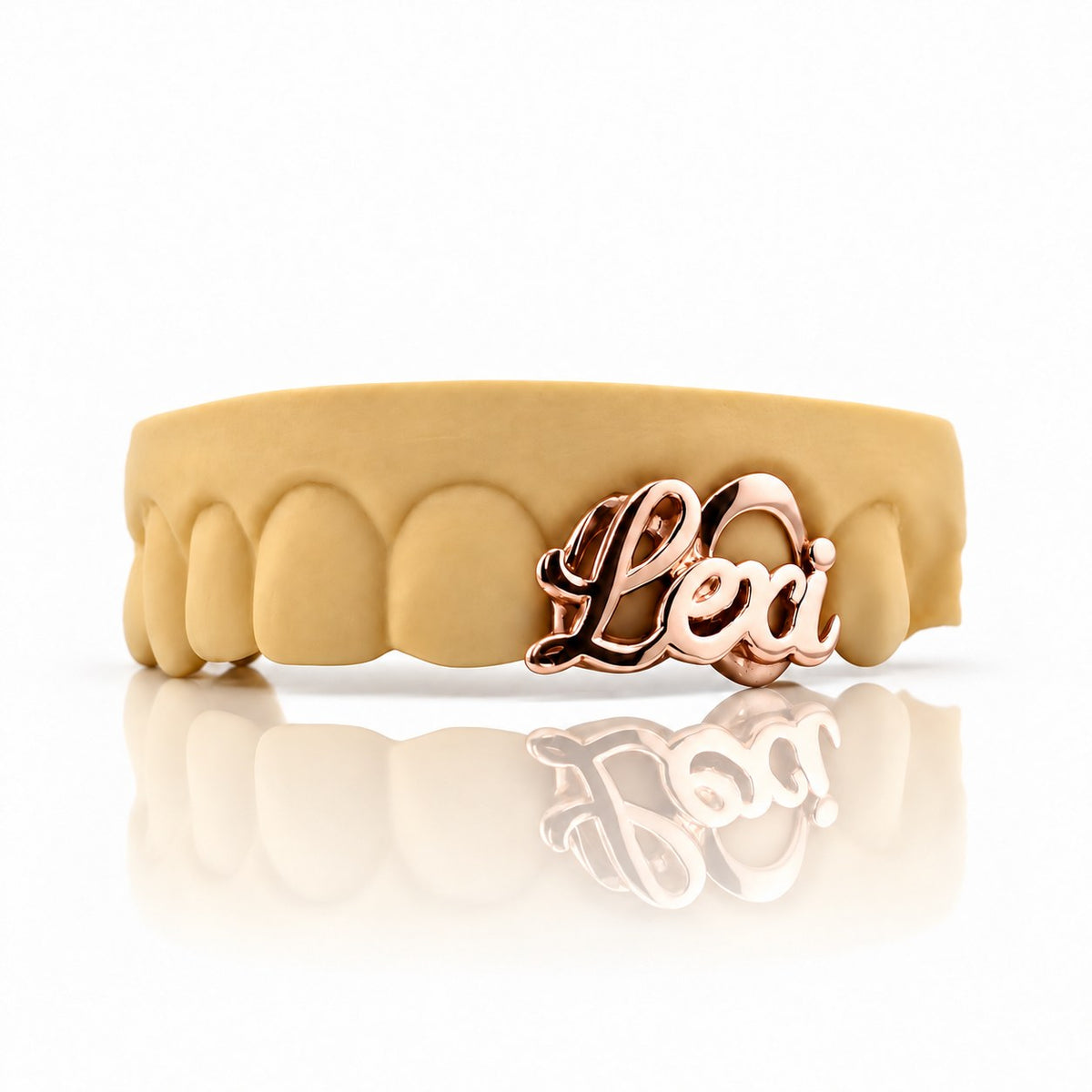 Custom 2pc top grillz with script name and open face, rose gold plated 925 silver - angle 1