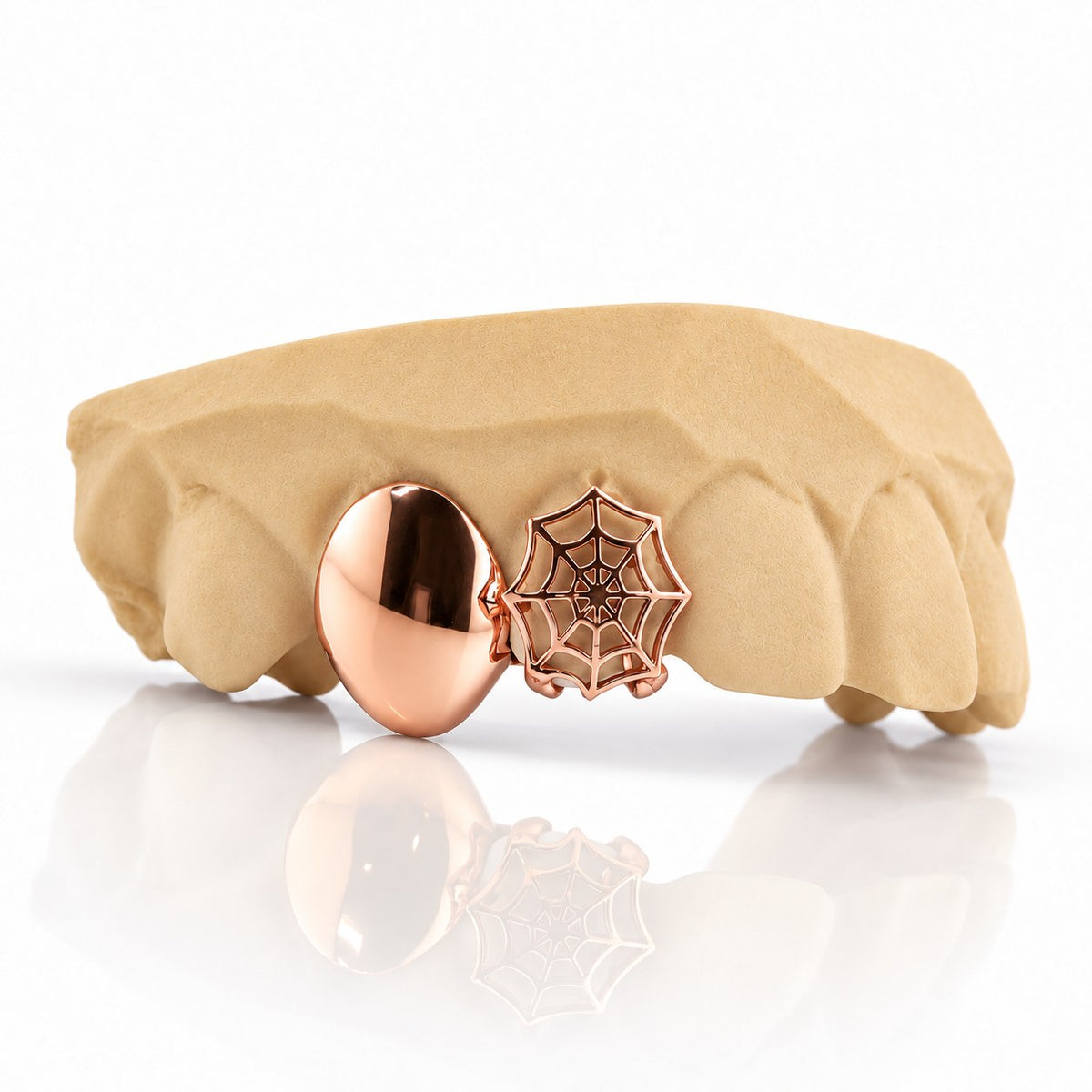 Custom 2pc top grillz with solid cap and spiderweb cutout, rose gold plated 925 silver - angle 2
