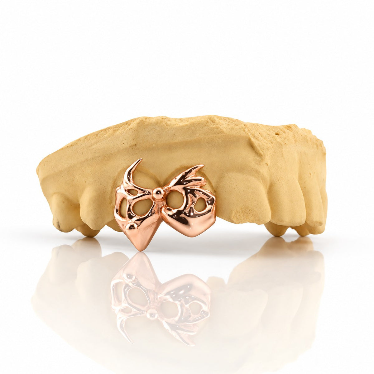 Custom 2pc top grillz with openwork bow design, rose gold plated 925 silver - angle 1